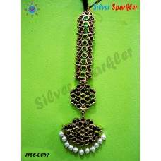 Traditional Twin leaf and Pear shaped Head single set with Red kempstones and Green stones with pearl hangings,also called as chutti on forehead for bridal and bharathanatyam jewellery