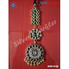 Traditional Twin leaf and Pear shaped Head single set with Red kempstones and Green and White Stones with pearl hangings,also called as chutti on forehead for bridal and bharathanatyam jewellery.
