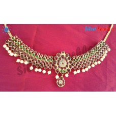 Traditional Temple jewellery Four line stone necklace with pear shaped pendant aand pearl hangings.